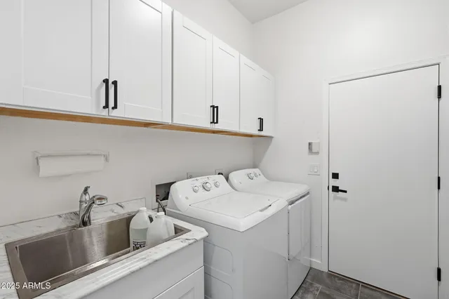 a bedroom with a bed and a fireplace