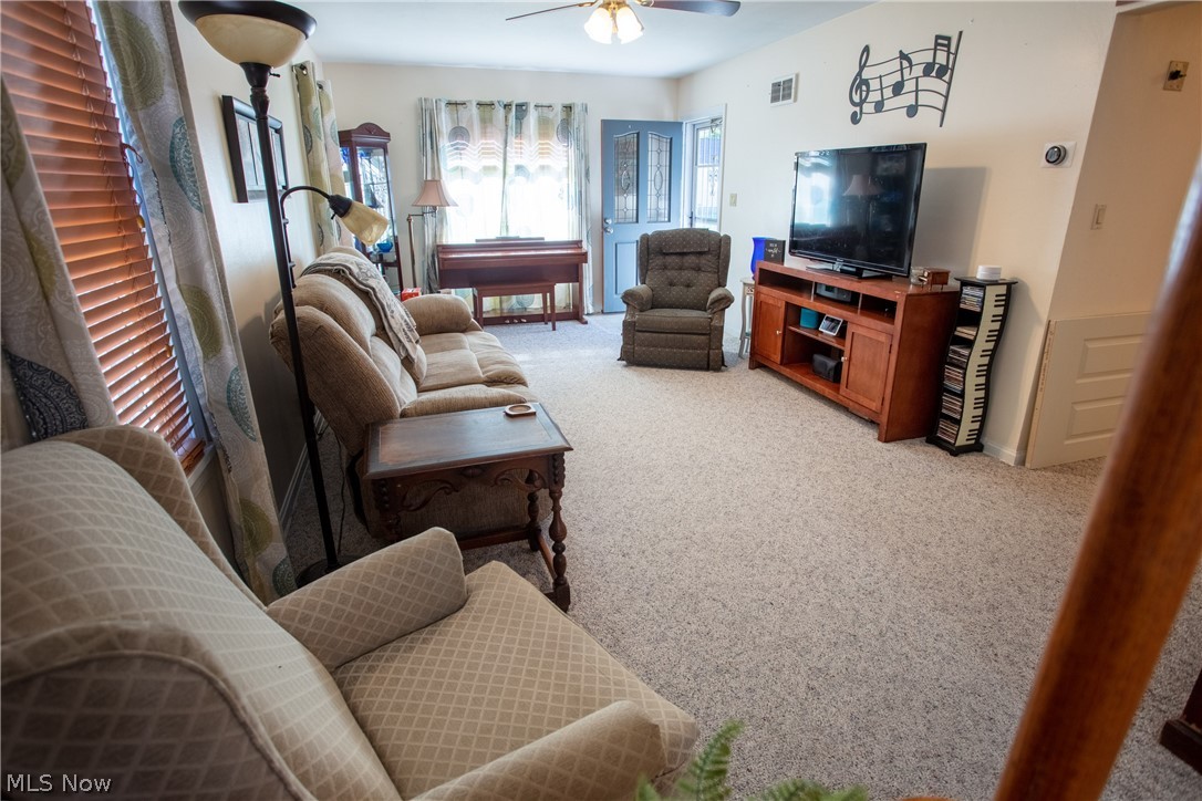 136 Stephens Road Akron, OH 44312 - Photo 5 of 22 View of living room and front entryway from eat-in kitchen