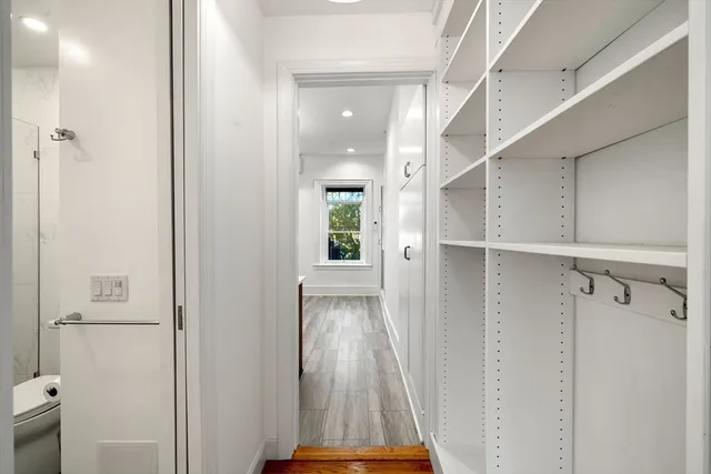 a view of entryway with wooden floor
