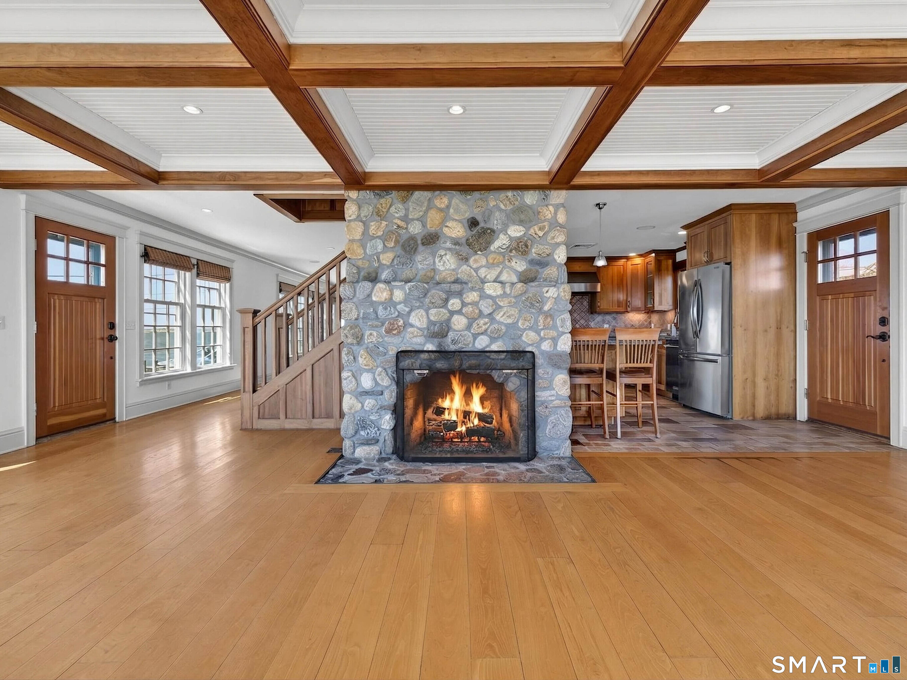 4 Point Road Old Saybrook, CT 06475 - Photo 14 of 58 a view of an empty room with fireplace and a window