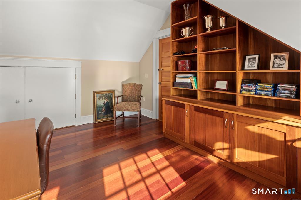 4 Point Road Old Saybrook, CT 06475 - Photo 41 of 58 a view of a workspace with furniture and wooden floor