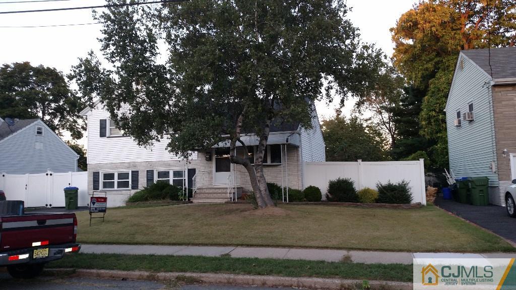 23 Wilshire Road Edison, NJ 08817 - Photo 2 of 21 a view of a town with large trees