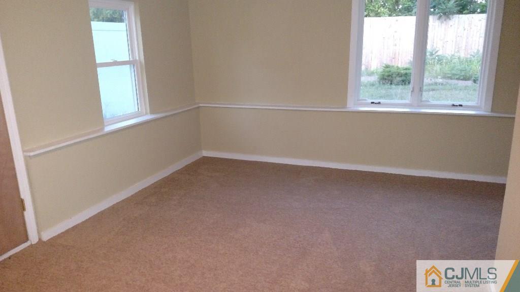23 Wilshire Road Edison, NJ 08817 - Photo 20 of 21 an empty room with a window