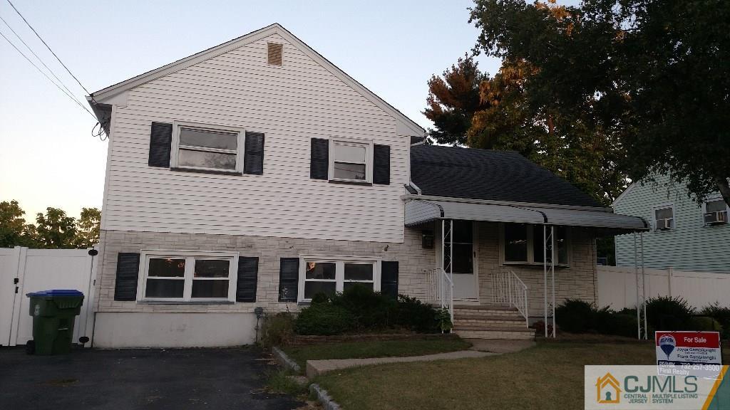 23 Wilshire Road Edison, NJ 08817 - Photo 21 of 21 a front view of a house with a yard