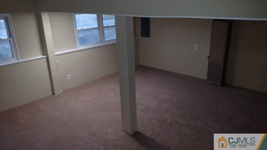 23 Wilshire Road Edison, NJ 08817 - Photo 6 of 21 a view of an empty room