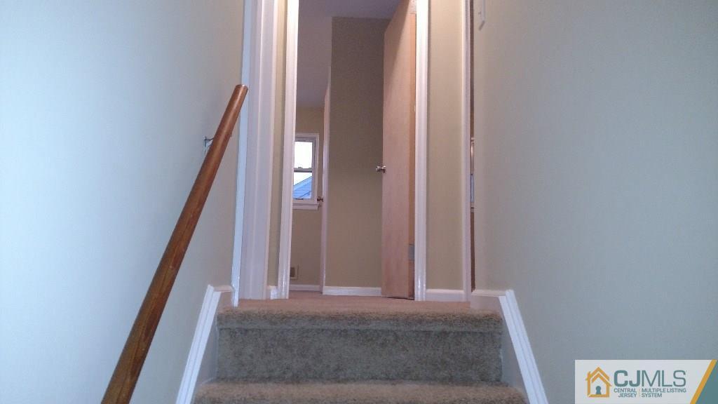 23 Wilshire Road Edison, NJ 08817 - Photo 8 of 21 a view of an entryway with staircase