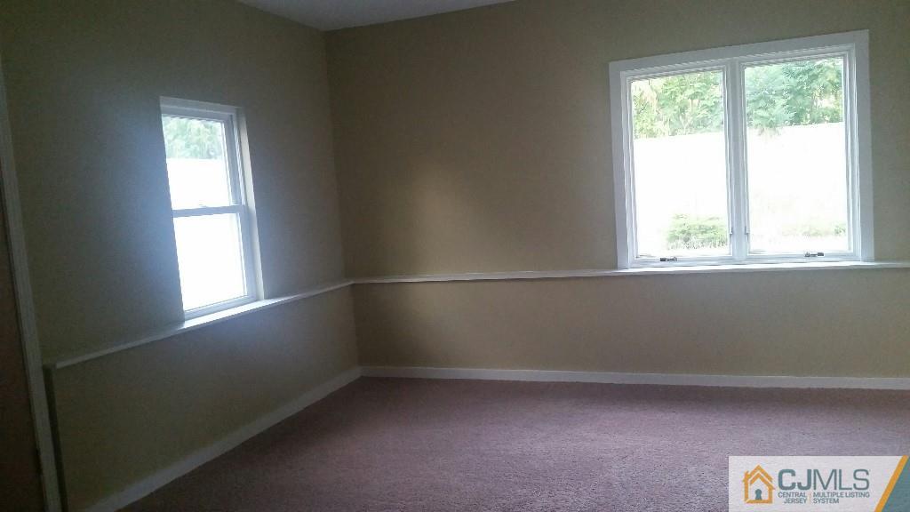 23 Wilshire Road Edison, NJ 08817 - Photo 10 of 21 an empty room with a window