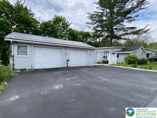 2236 Hillside Road Slatington, PA 18080 - Photo 1 of 13 a view of a house with a garage