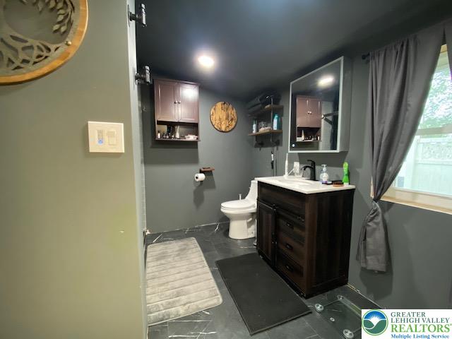 2236 Hillside Road Slatington, PA 18080 - Photo 7 of 13 a bathroom with a sink and a mirror