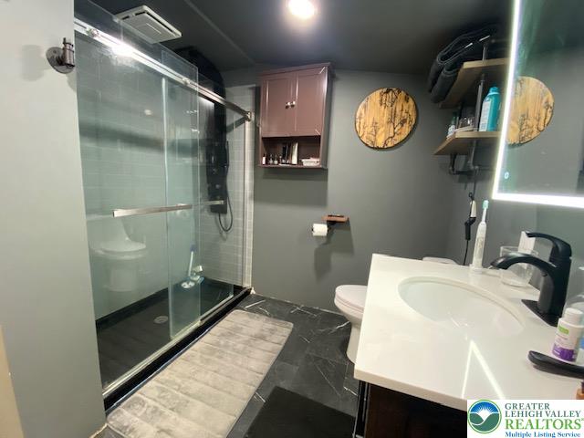 2236 Hillside Road Slatington, PA 18080 - Photo 8 of 13 a bathroom with a sink and a mirror