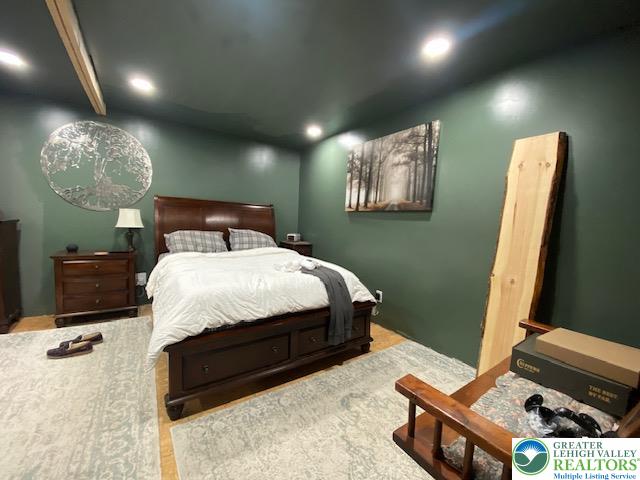 2236 Hillside Road Slatington, PA 18080 - Photo 9 of 13 a bed room with a bed mirror and a television