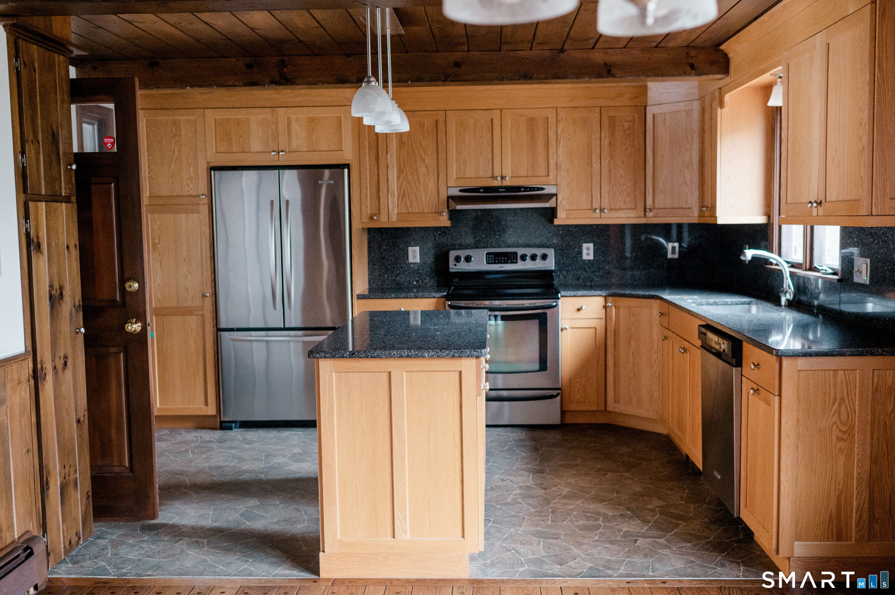 228 Ruby Road Willington, CT 06279 - Photo 5 of 41 Updated Kitchen with Oak Cabinets and Quartz Countertops.