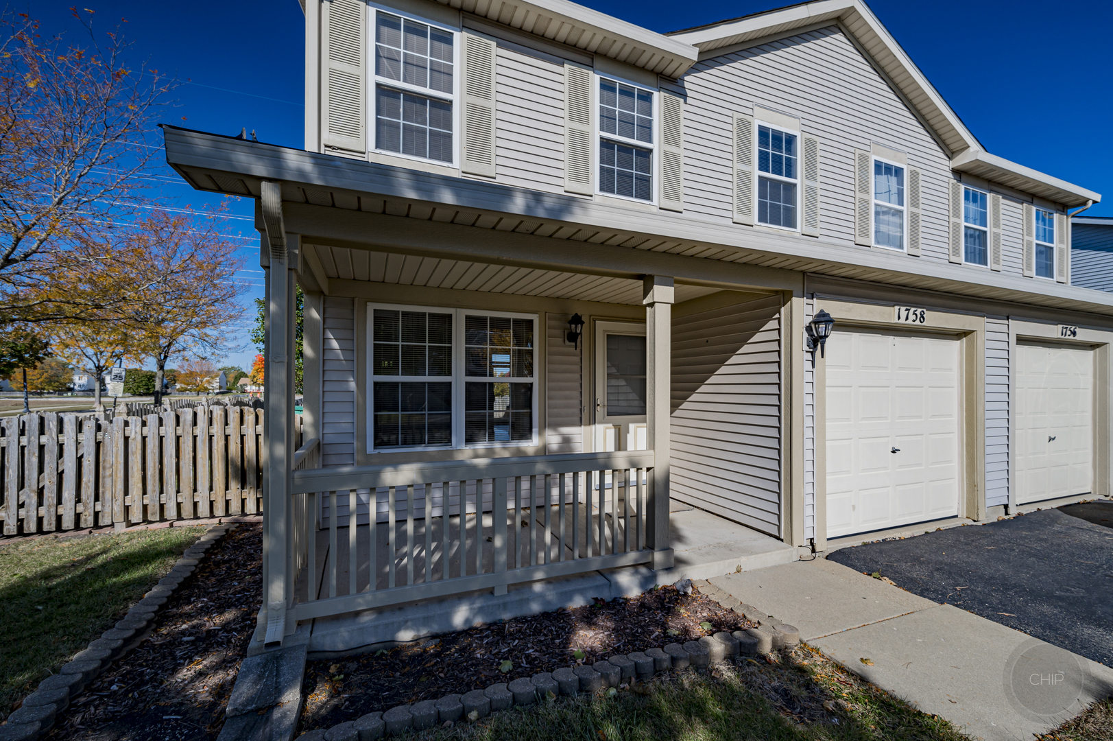 1758 Raleigh Trail Romeoville, IL 60446 - Photo 1 of 1 a view of a house with wooden fence