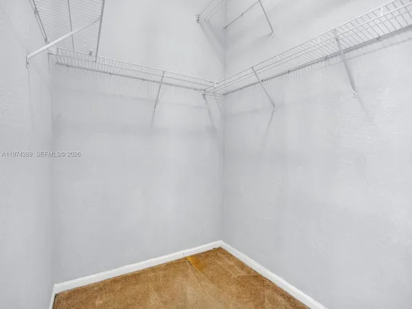 a view of a room with racks on the wall