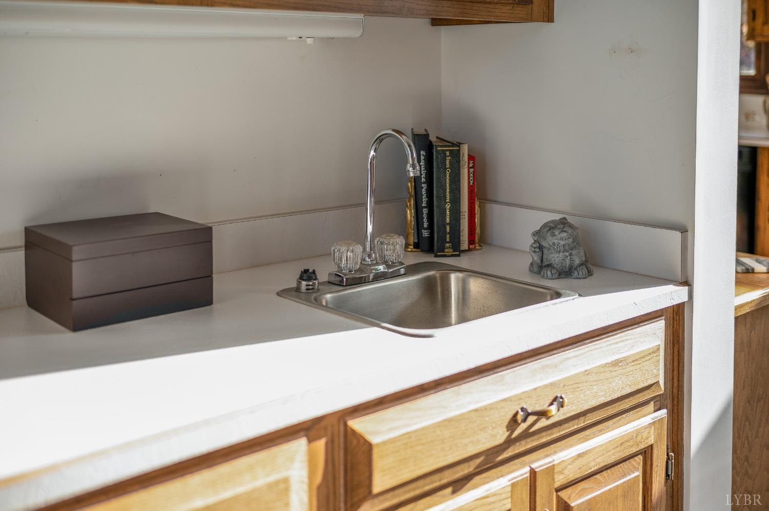 7903 Charlemont Road Goode, VA 24556 - Photo 26 of 47 a close view of sink and tap