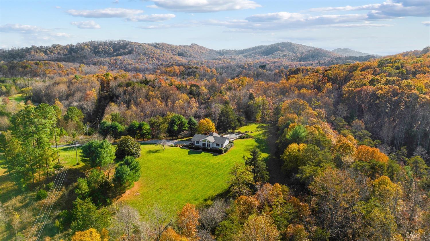 7903 Charlemont Road Goode, VA 24556 - Photo 3 of 47 a view of lake and mountain