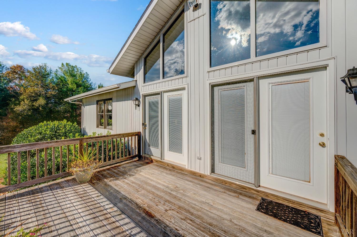 7903 Charlemont Road Goode, VA 24556 - Photo 36 of 47 a view of a house with wooden deck