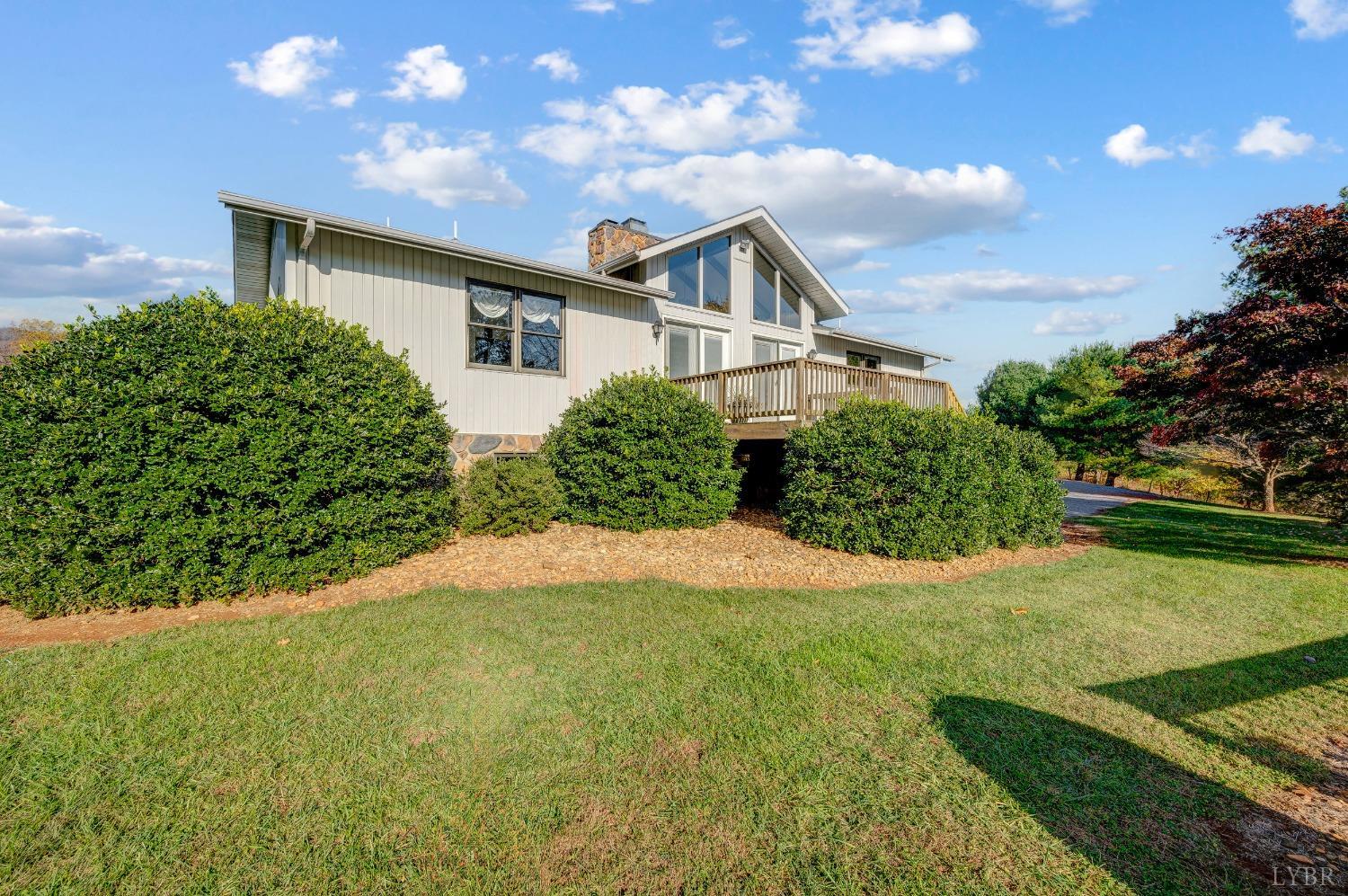 7903 Charlemont Road Goode, VA 24556 - Photo 39 of 47 a view of a house with a yard