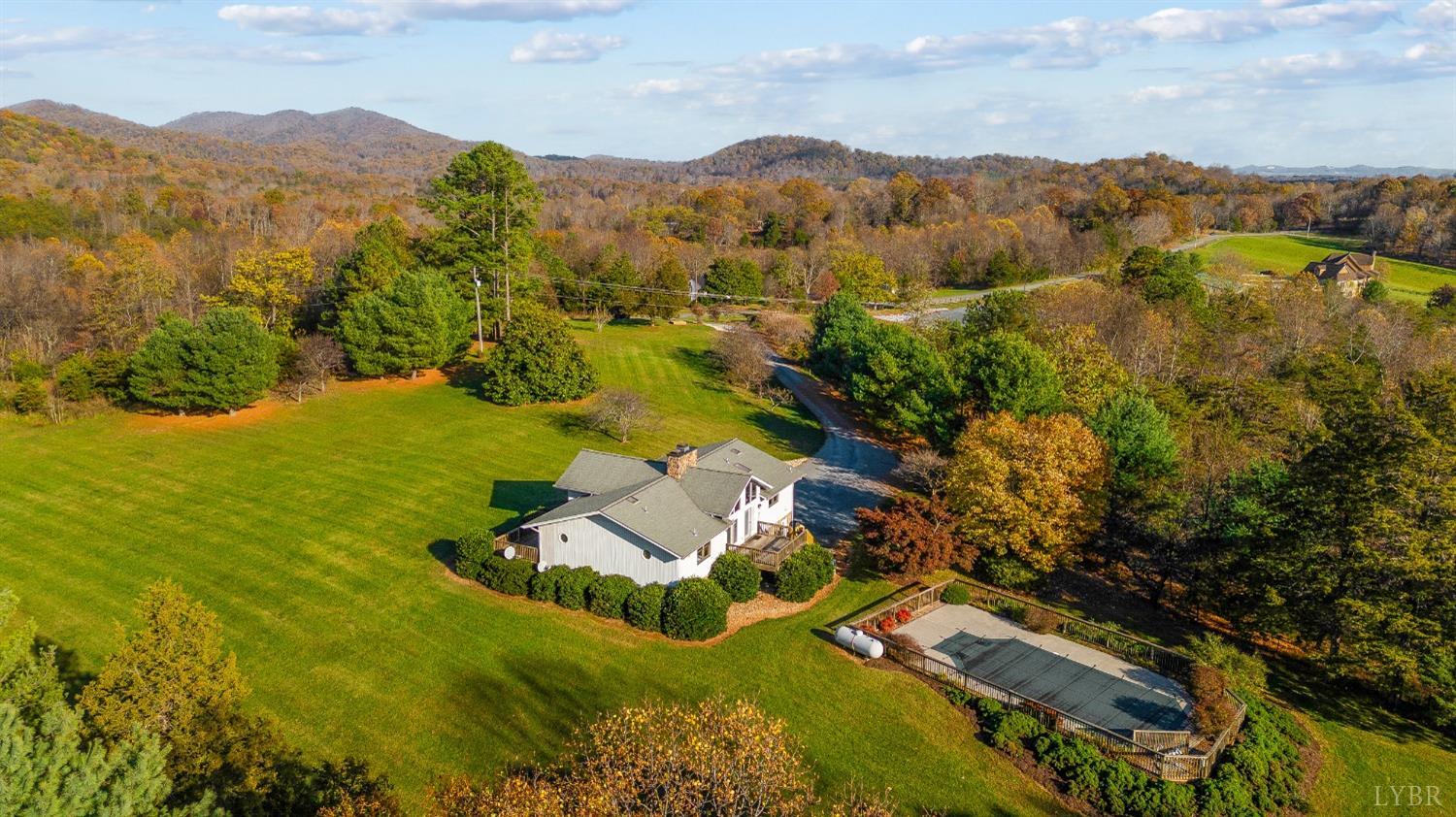 7903 Charlemont Road Goode, VA 24556 - Photo 46 of 47 an aerial view of residential houses with outdoor space