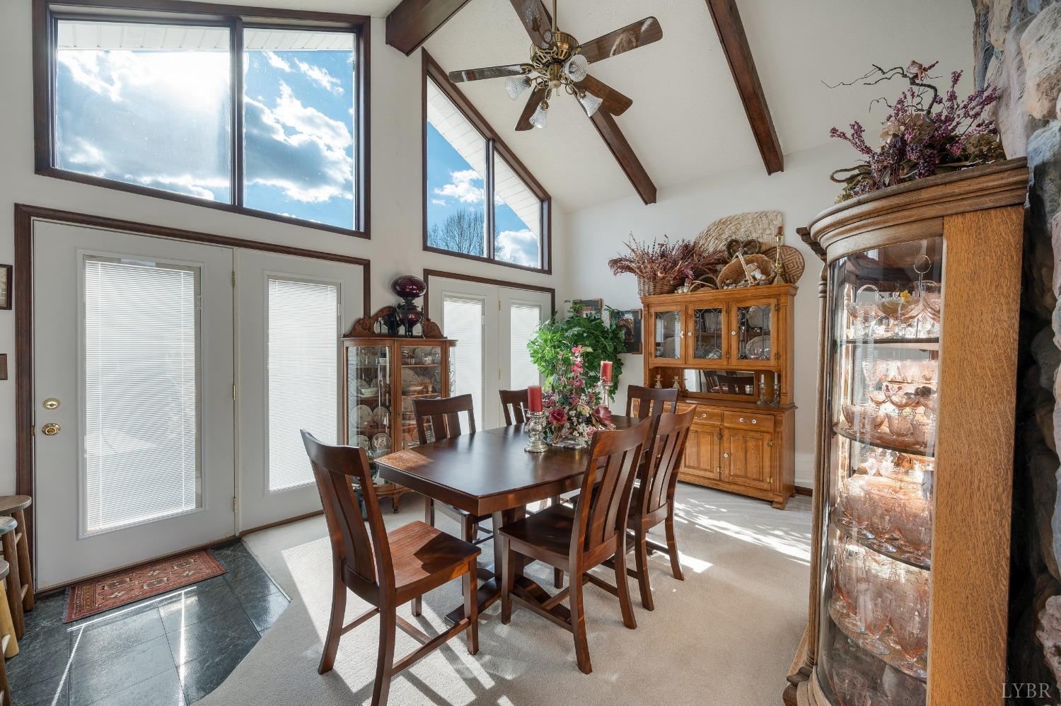 7903 Charlemont Road Goode, VA 24556 - Photo 9 of 47 a view of a dining room with furniture and window