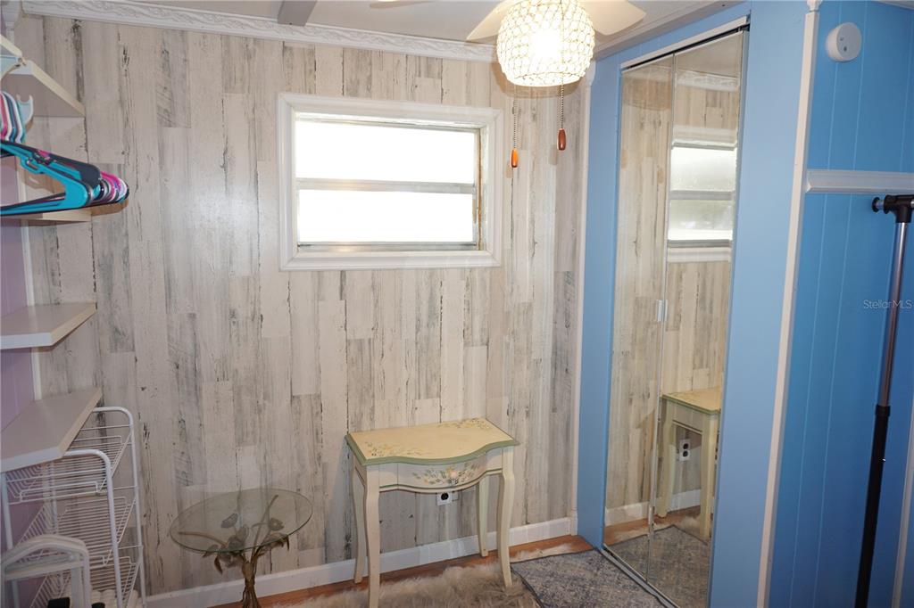 15371 Mango Drive Punta Gorda, FL 33955 - Photo 24 of 62 a bathroom with a granite countertop shower a mirror and a sink