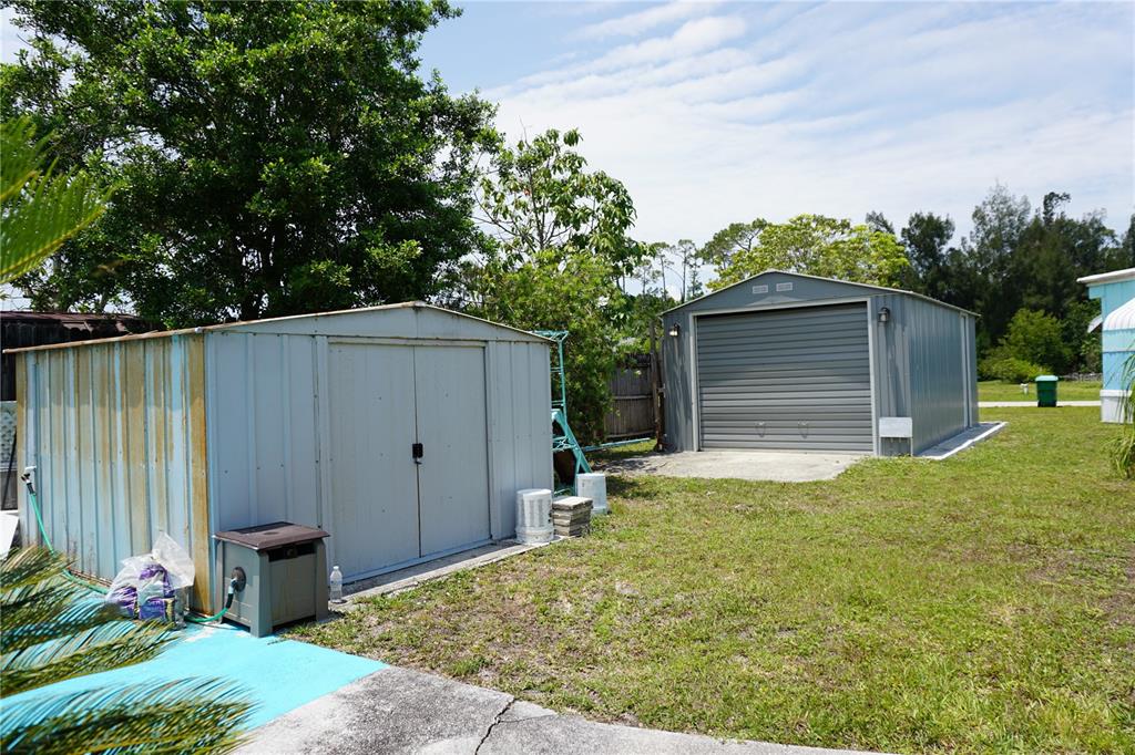 15371 Mango Drive Punta Gorda, FL 33955 - Photo 41 of 62 a front view of a house with garden