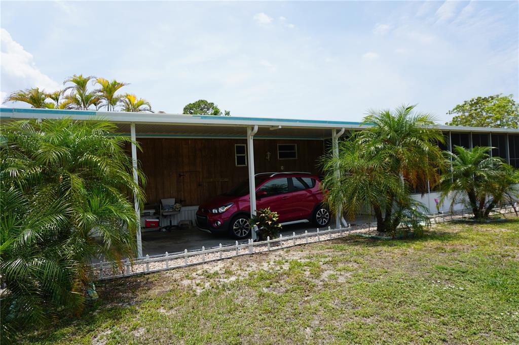 15371 Mango Drive Punta Gorda, FL 33955 - Photo 55 of 62 front view of a house with a porch
