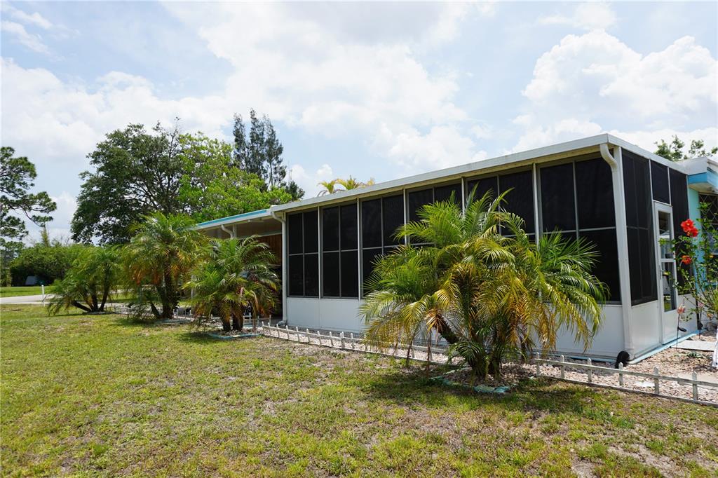 15371 Mango Drive Punta Gorda, FL 33955 - Photo 56 of 62 a view of house with swimming pool and porch with furniture