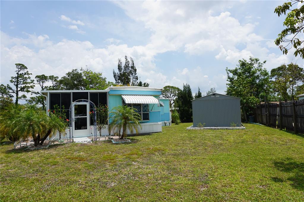 15371 Mango Drive Punta Gorda, FL 33955 - Photo 58 of 62 a view of a house with backyard and porch