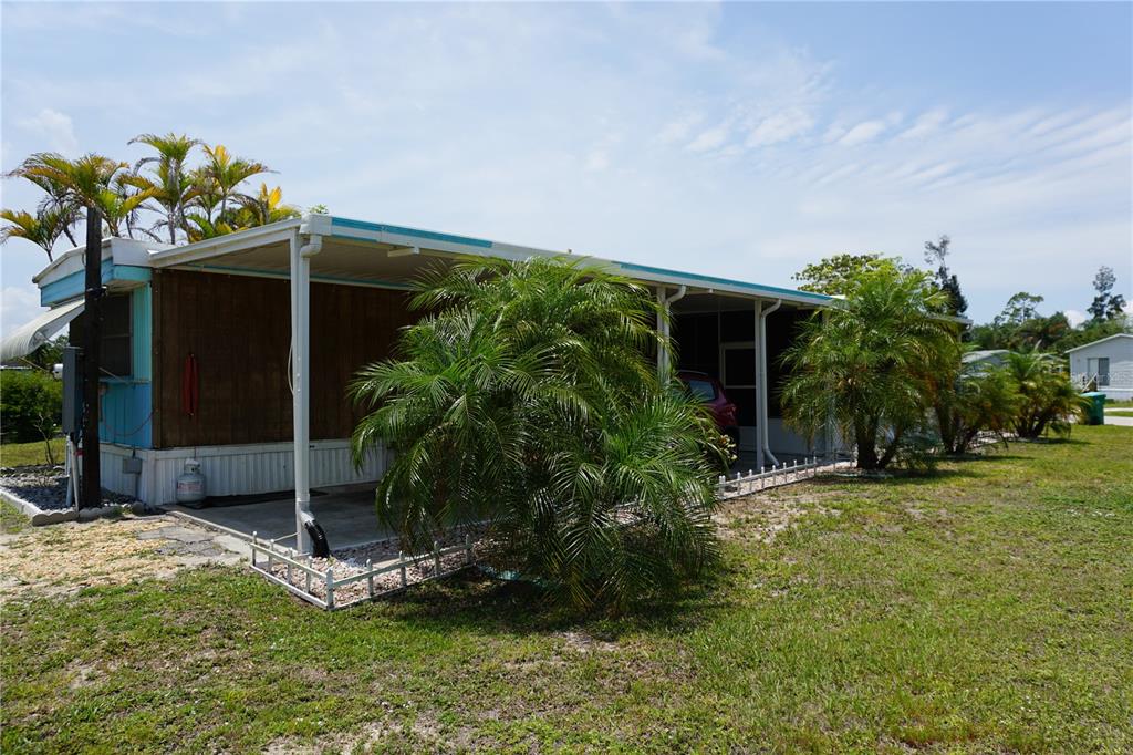 15371 Mango Drive Punta Gorda, FL 33955 - Photo 8 of 62 a view of a backyard