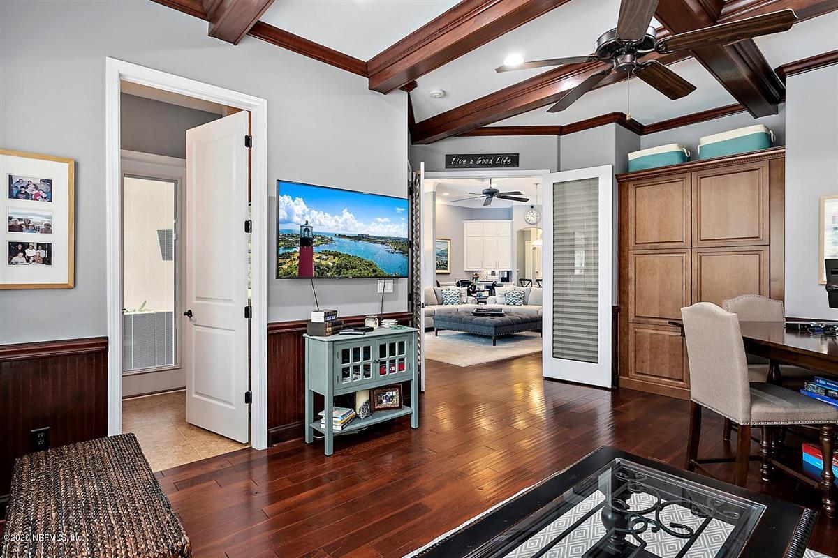 504 Saddlestone Drive St. Johns, FL 32259 - Photo 15 of 42 a living room with furniture and a table