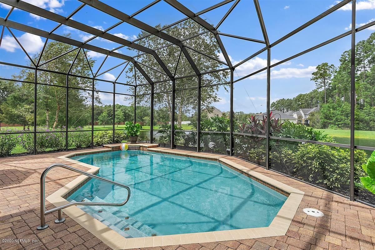 504 Saddlestone Drive St. Johns, FL 32259 - Photo 30 of 42 a view of swimming pool with a patio