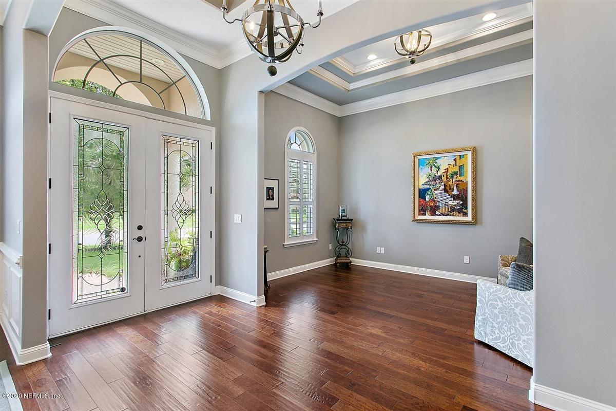 504 Saddlestone Drive St. Johns, FL 32259 - Photo 3 of 42 a view of an entryway with wooden floor