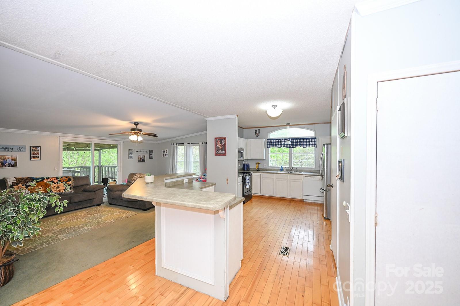 307 Dewitt Owens Road Rutherfordton, NC 28139 - Photo 12 of 40 a view of a living room and kitchen