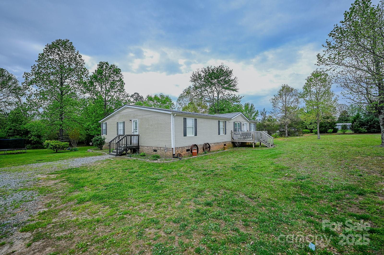 307 Dewitt Owens Road Rutherfordton, NC 28139 - Photo 38 of 40 a house view with a garden space