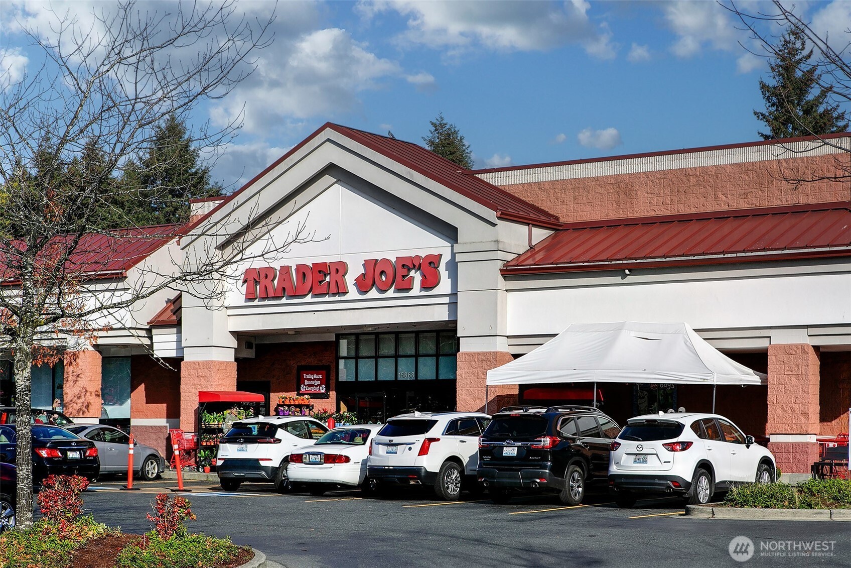 16504 3rd Avenue Southwest Burien, WA 98148 - Photo 11 of 17 a store with outdoor cars parked in front of retail shop