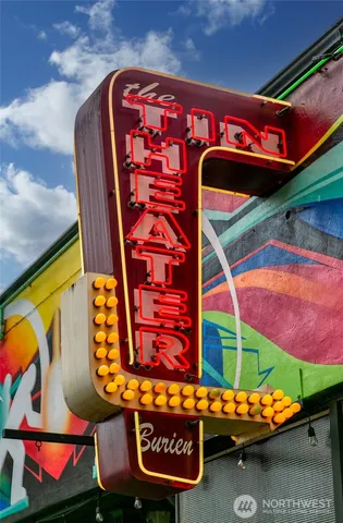 a view of a chairs and table in the patio