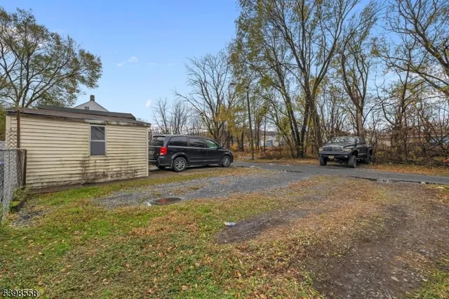 a view of street with parked cars