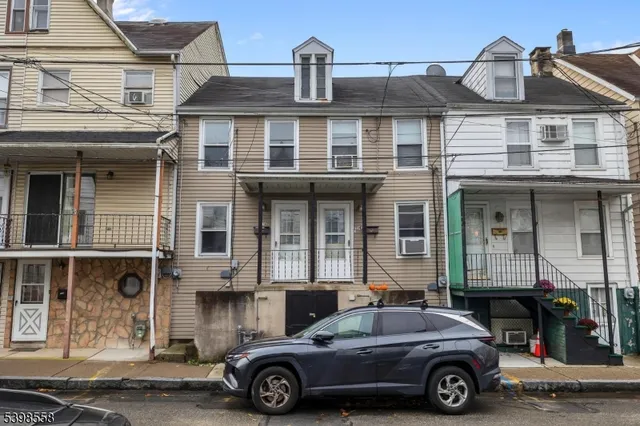 a car parked in front of a building