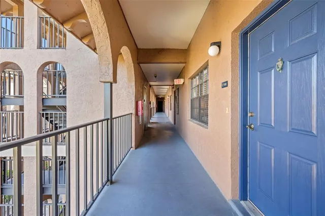swimming pool view with a garden space