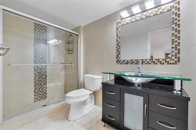 an empty room with windows and entrance