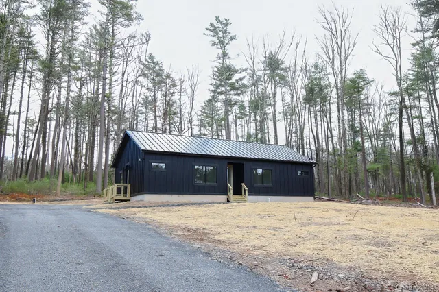 a house view with a outdoor space