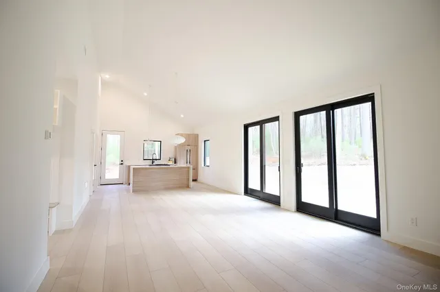a view of a livingroom with a furniture and window