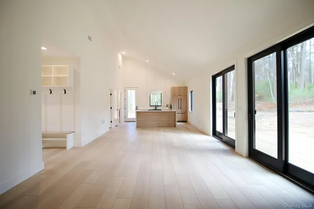 a view of a livingroom with wooden floor
