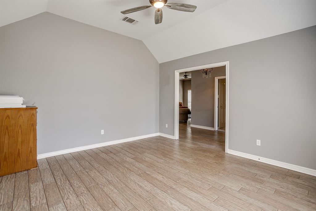 2300 Walter Smith Road Azle, TX 76020 - Photo 11 of 40 wooden floor in an empty room with a window