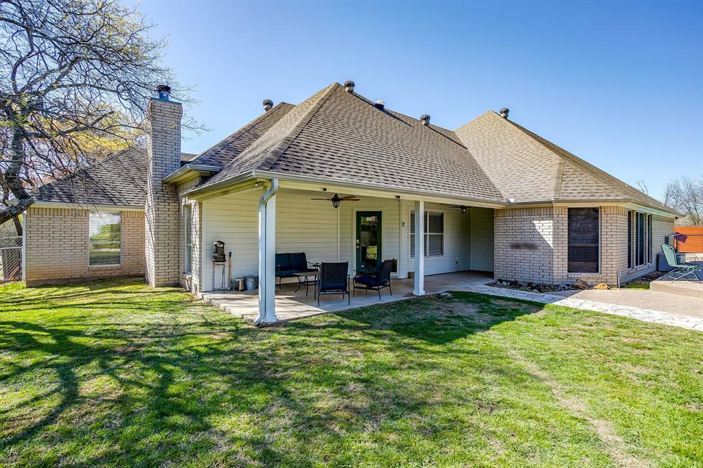 2300 Walter Smith Road Azle, TX 76020 - Photo 33 of 40 front view of a house with a yard