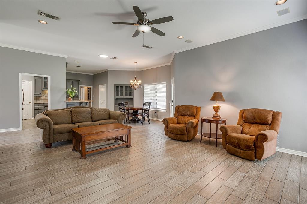 2300 Walter Smith Road Azle, TX 76020 - Photo 7 of 40 a living room with furniture and a wooden floor