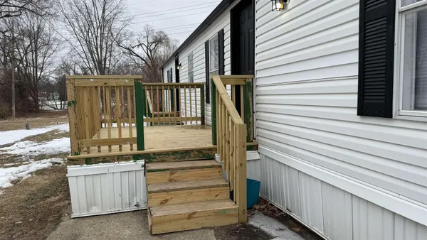 a view of entryway with a front door