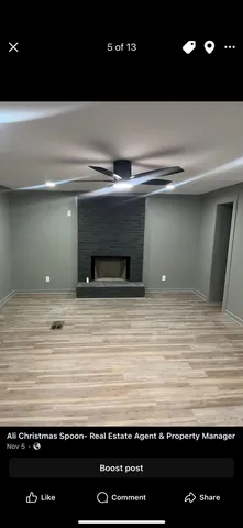 a view of kitchen island with stainless steel appliances
