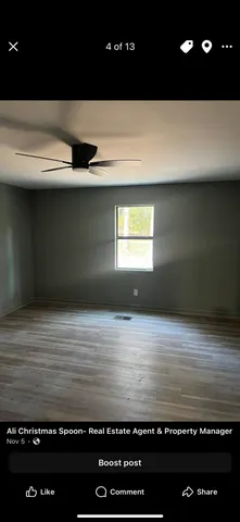 a kitchen with a sink a stove and cabinets